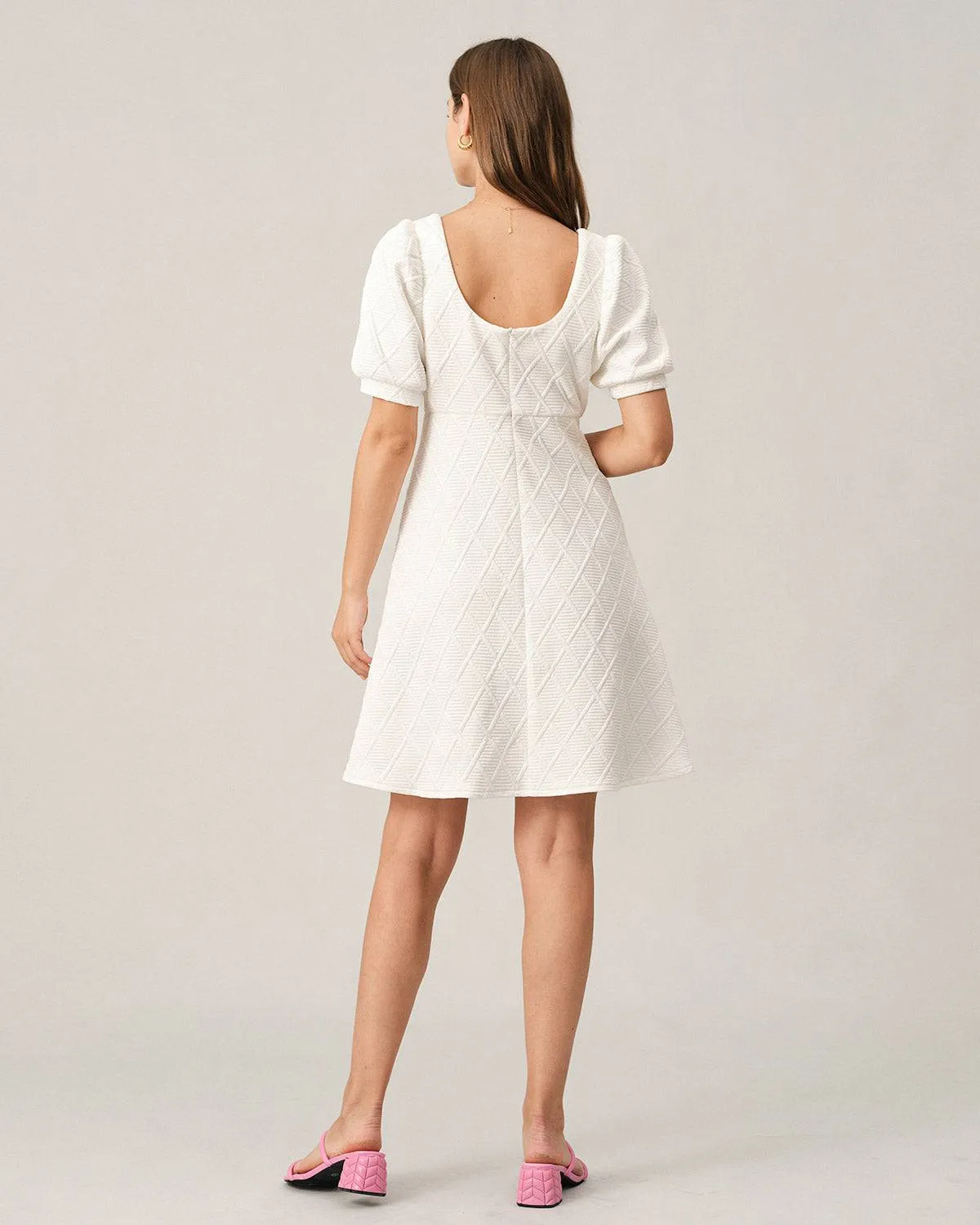 The Solid Textured Puff Sleeve Mini Dress